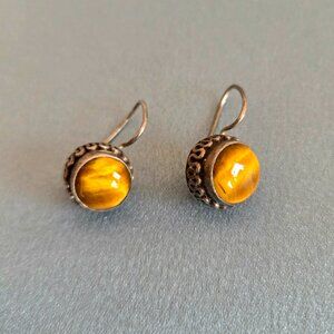 Sterling silver earrings with Tiger eye stones.